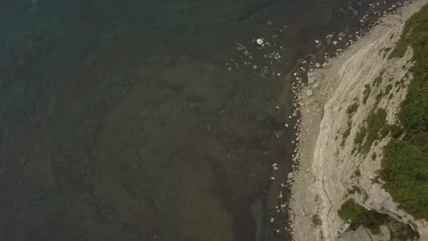 Aerial view of the white columnar joint cape and coastline. Video stock 160403403