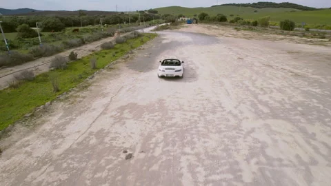 Aerial view White convertible drive offroad Stock Footage 259968935