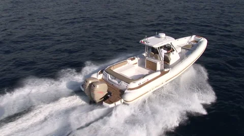 Aerial view of white maxi rib navigating at full speed Stock Footage 43229280