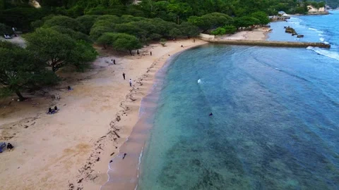 Aerial view of white sandy beach with tourists, blue sea water Stock-Footage 277861226