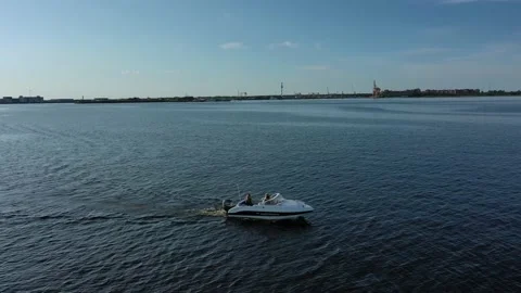 Aerial view of a white speedboat sailing against the background of Fort Stock Footage 171608899