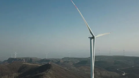 Aerial View of White Wind Turbines Rotating Video stock 334863988