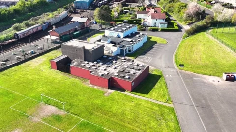 Aerial view of Whitehead Excursion Station and Whitehead Youth Centre County Stock Footage 278070160