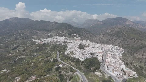 Aerial view of a whitewashed village on a mountain hillside Vídeos de archivo 342261899