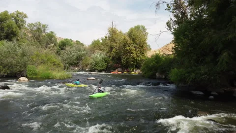 Aerial View Of Whitewater Kayakers On Scenic River Stock Footage 202591853