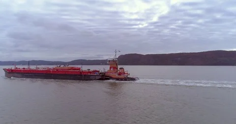 (Aerial) View of Wide River From Behind Industrial Ship Stock Footage 83793850