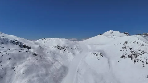Aerial view of wide slopes of Courchevel ski resort by winter Stock Footage 334228032