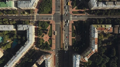 Aerial view of wide two-way road stretches between the complexes Stock Footage 112390634