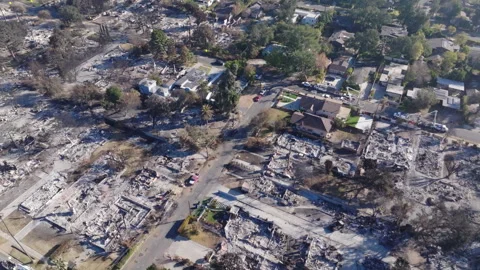 Aerial view of wildfire damage in Altadena neighborhood of Los Angeles Stock Footage 301641548