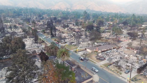 Aerial view of wildfire damage in Altadena neighborhood of Los Angeles Stock Footage 301647345