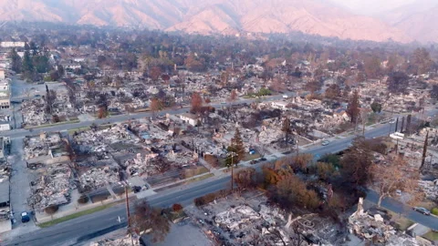 Aerial view of wildfire damage in Altadena neighborhood of Los Angeles Stock Footage 301648031