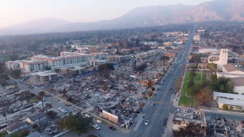 Aerial view of wildfire damage in Altadena neighborhood of Los Angeles Stock Footage 301652380
