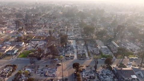 Aerial view of wildfire damage in Altadena neighborhood of Los Angeles Stock Footage 301653590