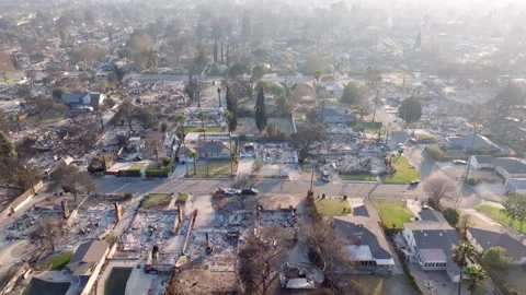Aerial view of wildfire damage in Altadena neighborhood of Los Angeles Stock Footage 301658614