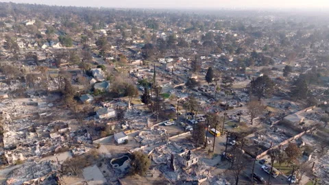 Aerial view of wildfire damage in Altadena neighborhood of Los Angeles Stock Footage 301662402