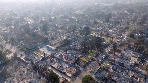 Aerial view of wildfire damage in Altadena neighborhood of Los Angeles Stock Footage 301665490