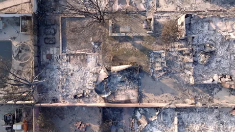 Aerial view of wildfire damage in Altadena neighborhood of Los Angeles Stock Footage 301665672