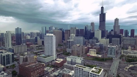 Aerial View of Willis Tower and Downtown Chicago Beneath Dramatic Clouds Stock Footage 120424191