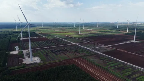 Aerial View of Wind Farm Across Former Peat Fields in Kaigu Bog, Latvia Stock Footage 341522698