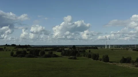 Aerial view of wind farm generating electricity power for local villages Stock Footage 114323960