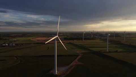 Aerial view of wind farm generating renewable energy at sunset 스톡 동영상 343309915