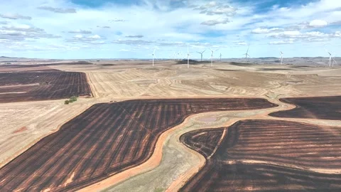 Aerial view of wind farm over agricultural fields in Australia. Stock Footage 341581712