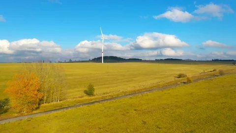 Aerial view to wind turbine. Camera flight around power plant. Stock Footage 120119434