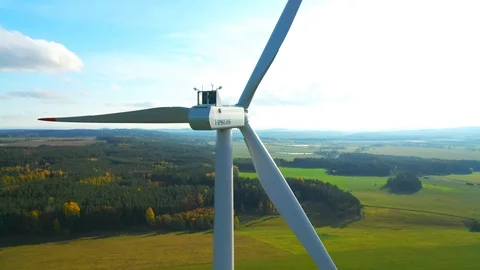 Aerial view to wind turbine. Camera flight around power plant. Stock Footage 120120105