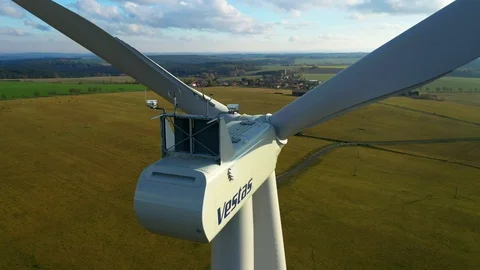 Aerial view to wind turbine. Camera flight around power plant. Stock Footage 120120593