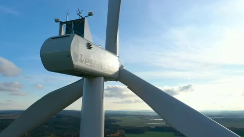 Aerial view to wind turbine. Camera flight around power plant. Stock Footage 120121648