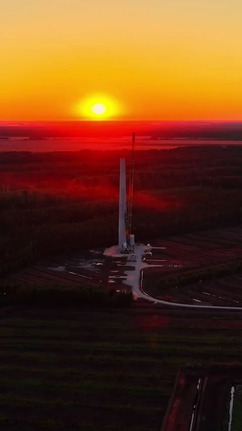 Aerial View Of Wind Turbine Construction Site At Golden Hour Sunset Stock Footage 336232159