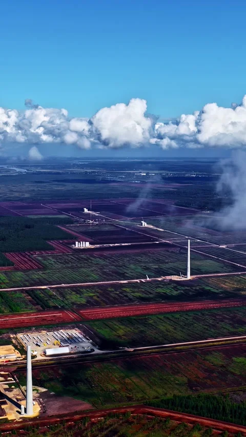Aerial view wind turbine construction across expansive agricultural fields Stock-Footage 337151395