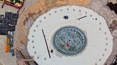 Aerial view of wind turbine foundation construction in Riga, Latvia. Stock Footage 340601720