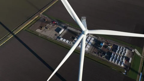 Aerial view of wind turbine generating renewable energy Stock Footage 327204094
