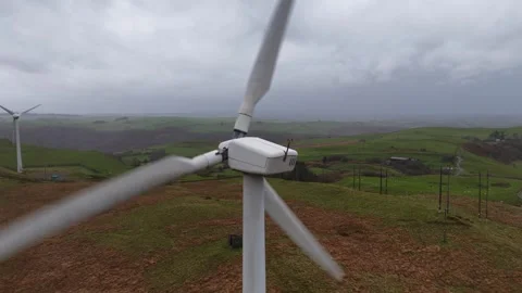 Aerial view of wind turbine generating renewable energy Stock Footage 327368481