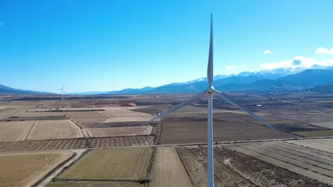Aerial view of wind turbine generating renewable energy Stock Footage 327550127