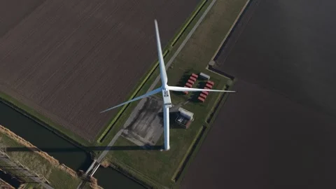 Aerial view of a wind turbine generating renewable energy Vídeos de archivo 330220968