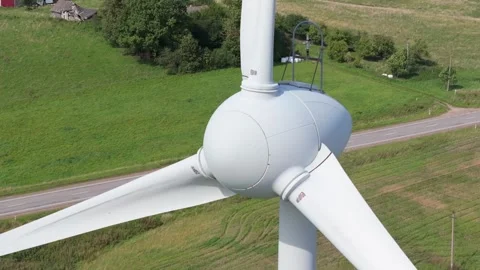 Aerial view of a wind turbine generator producing renewable energy Stock Footage 344278482