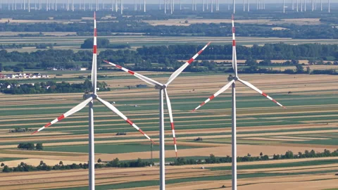 Aerial view of wind turbines cluster close-up Stock Footage 337940288