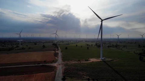 Aerial view of wind turbines on the fields Power generation using energy from cl Stock Footage 108962299