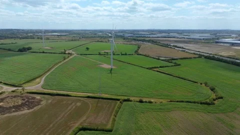 Aerial view of wind turbines in fields, United Kingdom. Stock Footage 316221607