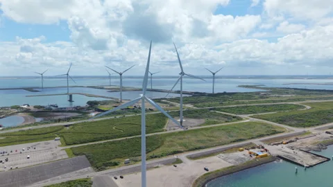 Aerial view of wind turbines generating renewable energy Stockbeeldmateriaal 338125565
