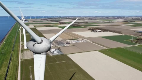 Aerial view of wind turbines generating renewable energy Stock Footage 343837336