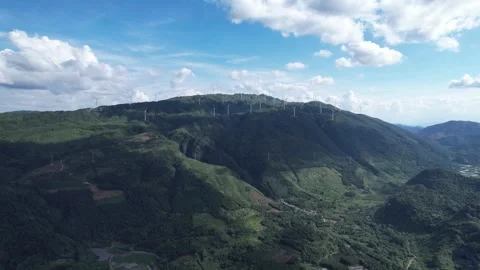 Aerial View of Wind Turbines on Lush Green Mountain Ridges in Rural China Stock Footage 342017794