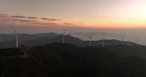 Aerial View of Wind Turbines on Mountain Top Stock Footage 217419176