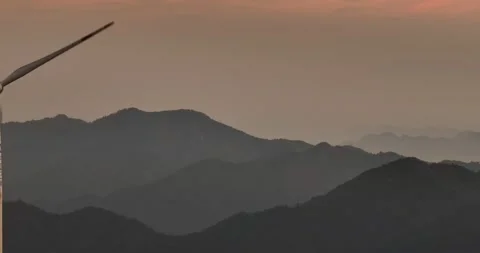 Aerial View of Wind Turbines on Mountain Top Stock Footage 217419690