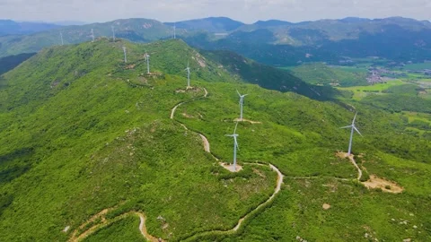 Aerial View of Wind Turbines on Mountain Grassland Rolling Green Hills Stock Footage 341908789