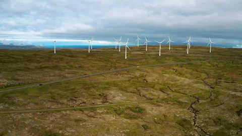 Aerial view of wind turbines in the mountains. Faroe islands. Stock Footage 202123765