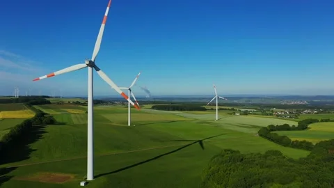 Aerial view of wind turbines over landscape Video stock 133553786