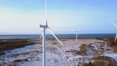 Aerial view of Wind turbines at sunset. Green clean renewable energy production Stock Footage 101077545